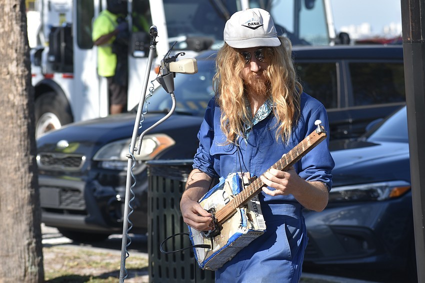 Photo of a guitarist shredding on his guitar at the Shred Stock event